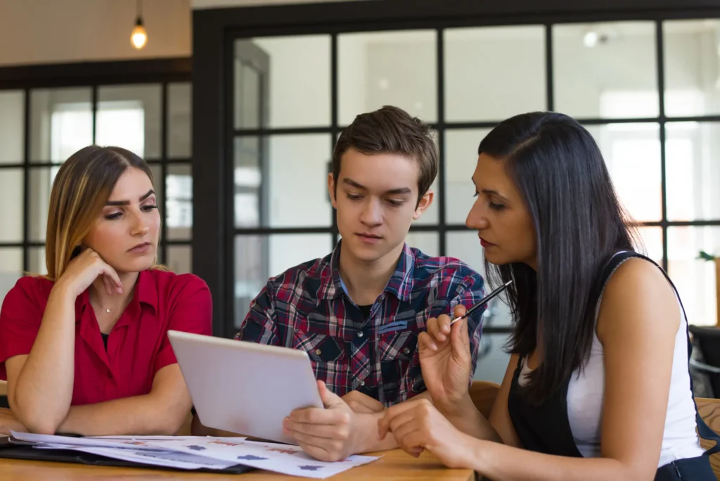 Students reviewing on notepad